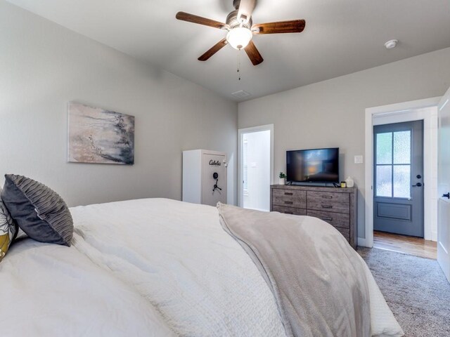 bedroom with baseboards, ceiling fan, carpet, and visible vents