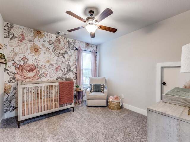 bedroom featuring visible vents, a ceiling fan, carpet, and baseboards