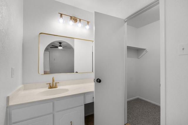 bathroom with vanity and ceiling fan