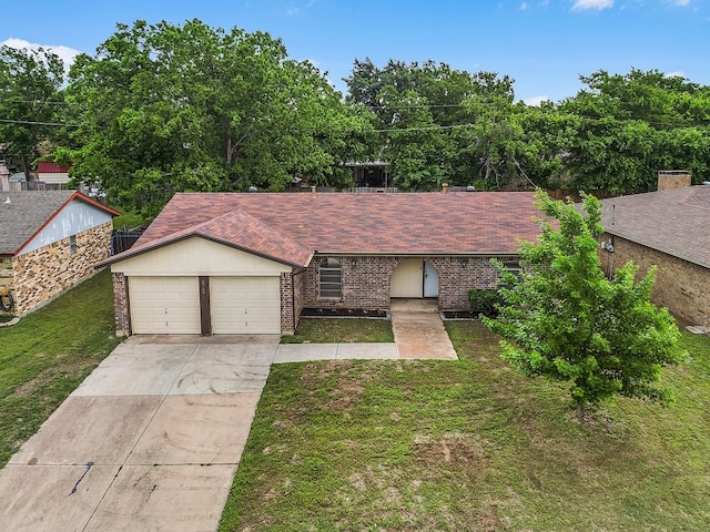 single story home with brick siding, driveway, a front yard, and a garage
