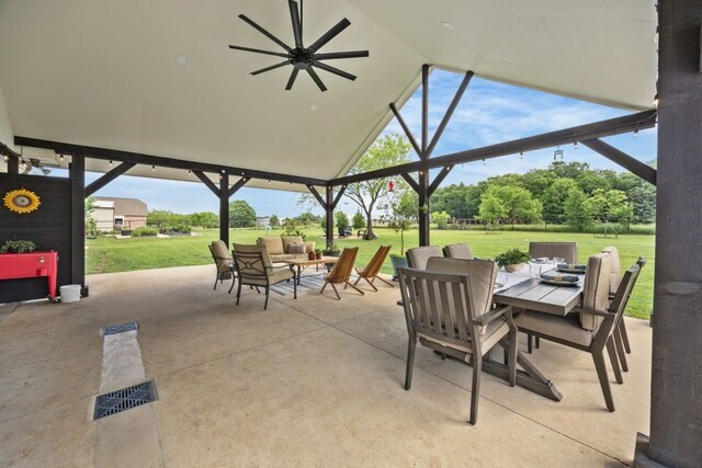 view of patio featuring a ceiling fan, outdoor dining area, and outdoor lounge area