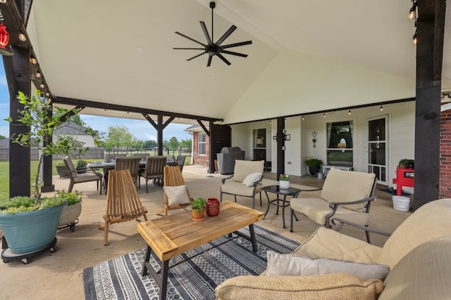 view of patio with fence, outdoor dining space, and outdoor lounge area
