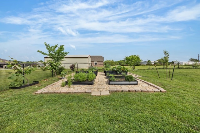 view of yard featuring a garden and fence