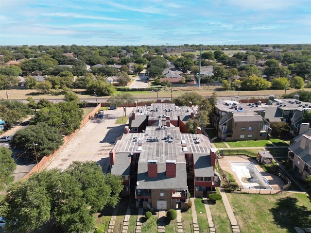 birds eye view of property with a residential view