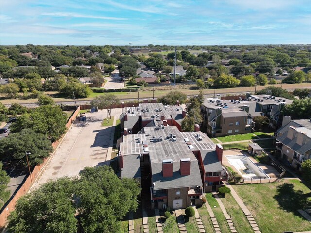 birds eye view of property with a residential view