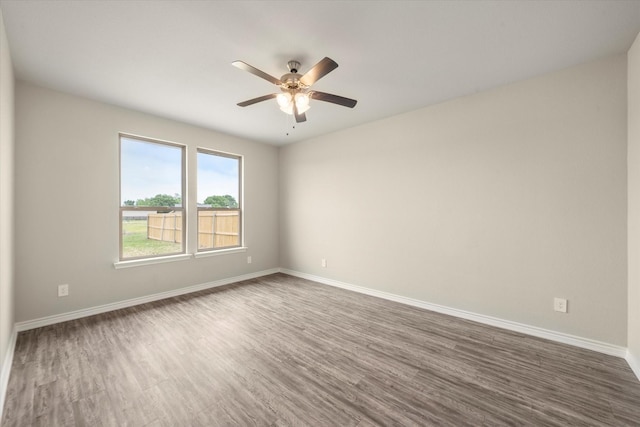 343 Preston Rd, Mabank, TX 75147 - spare room featuring baseboards, ceiling fan, and wood finished floors