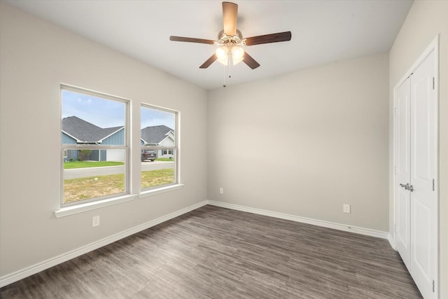 343 Preston Rd, Mabank, TX 75147 - unfurnished bedroom with baseboards, ceiling fan, wood finished floors, and a closet