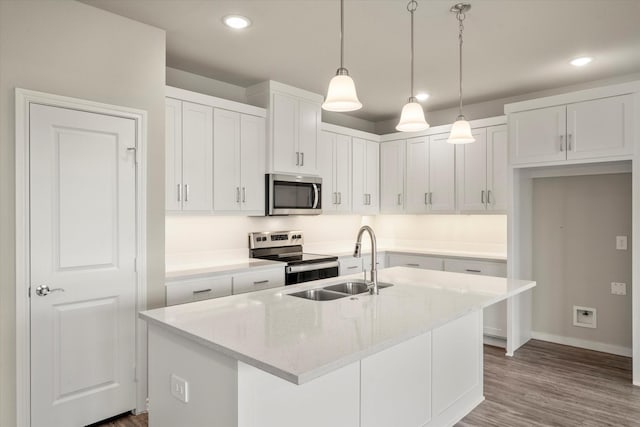 343 Preston Rd, Mabank, TX 75147 - kitchen featuring stainless steel appliances, recessed lighting, white cabinetry, and a sink