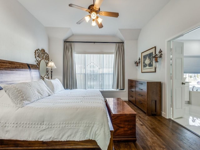 bedroom featuring baseboards, a ceiling fan, vaulted ceiling, and dark wood-style floors