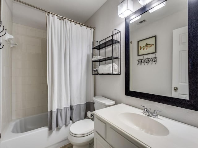 bathroom with visible vents, shower / tub combo, toilet, and vanity