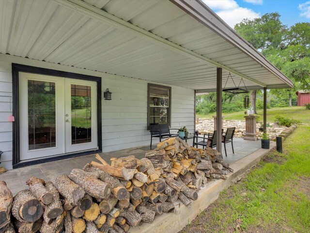 view of patio / terrace with a porch and french doors