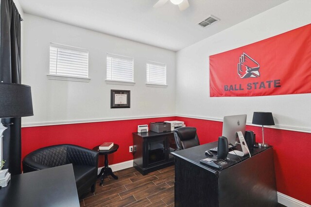 office space with ceiling fan, baseboards, visible vents, and wood finished floors
