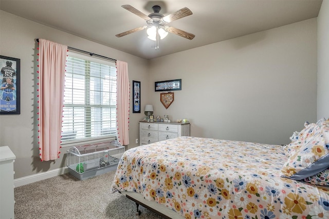 bedroom featuring baseboards, carpet floors, and ceiling fan