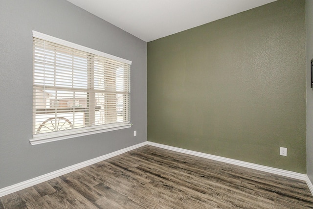 146 Willowbend Loop, Mabank, TX 75156 - unfurnished room with dark wood-type flooring and baseboards