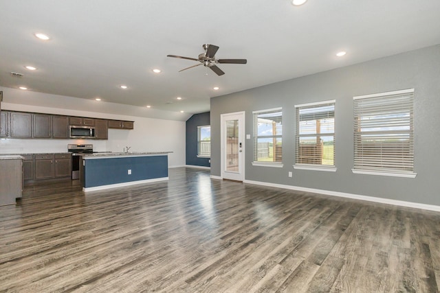 146 Willowbend Loop, Mabank, TX 75156 - unfurnished living room with a ceiling fan, baseboards, recessed lighting, and dark wood-style floors