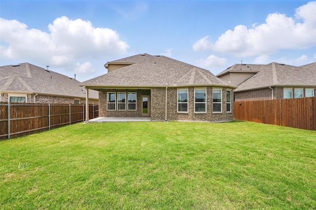 11316 Twisting Peak Rd, Fort Worth, TX 76052 - rear view of property featuring a patio, a fenced backyard, a lawn, and brick siding