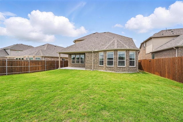 11316 Twisting Peak Rd, Fort Worth, TX 76052 - rear view of property with a lawn, brick siding, a fenced backyard, and a patio area