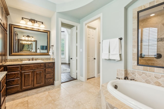 280 Gentry Dr, Prosper, TX 75078 - full bath featuring vanity, a bath, and tiled shower