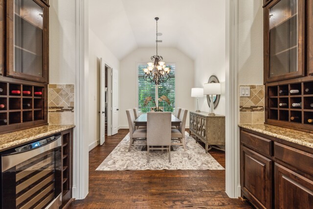 280 Gentry Dr, Prosper, TX 75078 - dining room with a chandelier, lofted ceiling, beverage cooler, and dark wood-type flooring