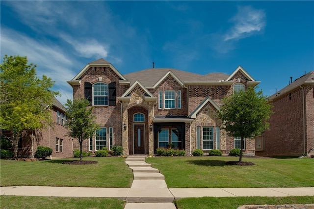 1290 Polo Heights Dr, Frisco, TX 75033 - traditional-style house with brick siding and a front lawn