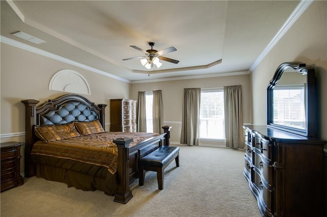 1290 Polo Heights Dr, Frisco, TX 75033 - bedroom featuring ceiling fan, visible vents, a raised ceiling, ornamental molding, and light carpet
