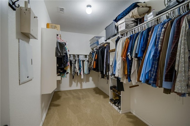 1290 Polo Heights Dr, Frisco, TX 75033 - walk in closet with visible vents and carpet