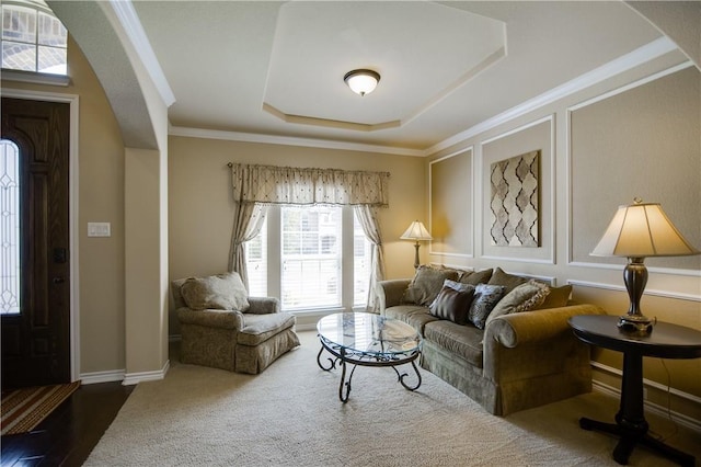 1290 Polo Heights Dr, Frisco, TX 75033 - living room featuring arched walkways, ornamental molding, baseboards, and a raised ceiling