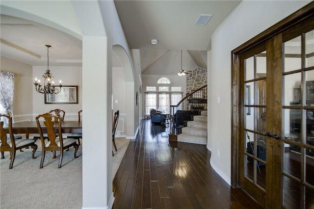 1290 Polo Heights Dr, Frisco, TX 75033 - foyer featuring stairs, arched walkways, baseboards, and visible vents