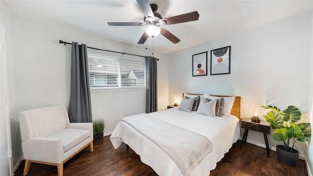 bedroom featuring baseboards, ceiling fan, and wood finished floors