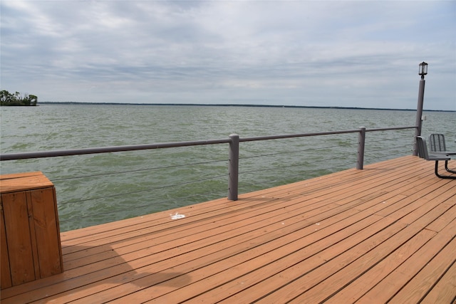 view of dock with a water view