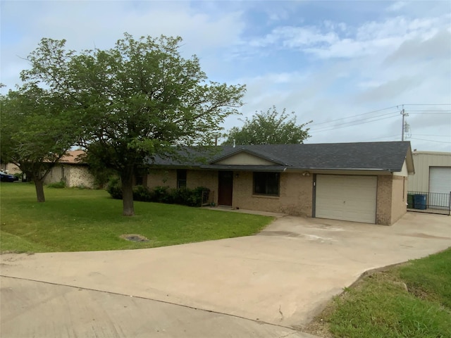 103 Jackilu St, Sanger, TX 76266 - single story home featuring an attached garage, driveway, and a front yard