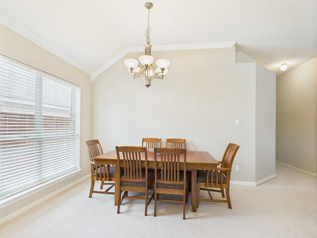 733 Willow Crest Dr, Midlothian, TX 76065 - dining room with a chandelier, ornamental molding, vaulted ceiling, light colored carpet, and baseboards