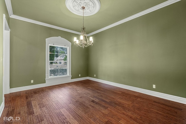 11 Chapel Creek Ln, Shreveport, LA 71106 - empty room with a chandelier, dark wood-style floors, baseboards, and crown molding
