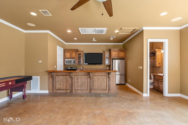 11 Chapel Creek Ln, Shreveport, LA 71106 - kitchen with appliances with stainless steel finishes, finished concrete floors, baseboards, a peninsula, and ornamental molding