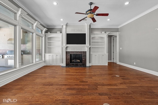 11 Chapel Creek Ln, Shreveport, LA 71106 - unfurnished living room with a ceiling fan, recessed lighting, a high end fireplace, crown molding, and wood finished floors
