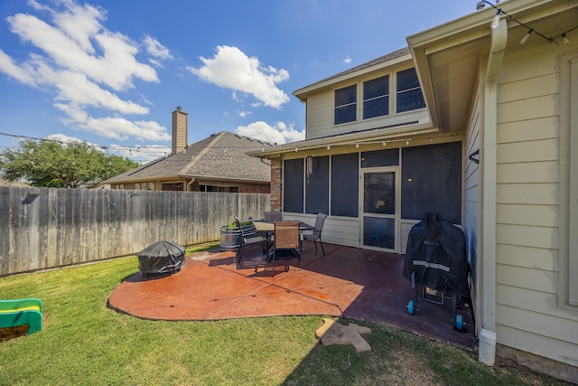 3949 Sunnygate Dr, Fort Worth, TX 76262 - view of patio / terrace featuring an outdoor fire pit and a sunroom