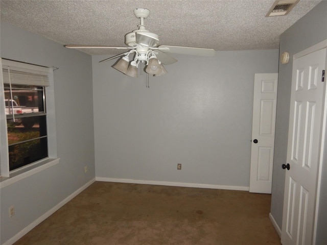 8157 Hobbs Dr, Shreveport, LA 71129 - empty room featuring visible vents, a textured ceiling, ceiling fan, and carpet floors