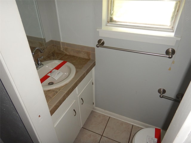 8157 Hobbs Dr, Shreveport, LA 71129 - half bathroom featuring vanity and tile patterned floors