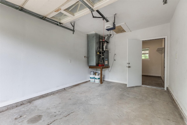 garage featuring baseboards and a garage door opener