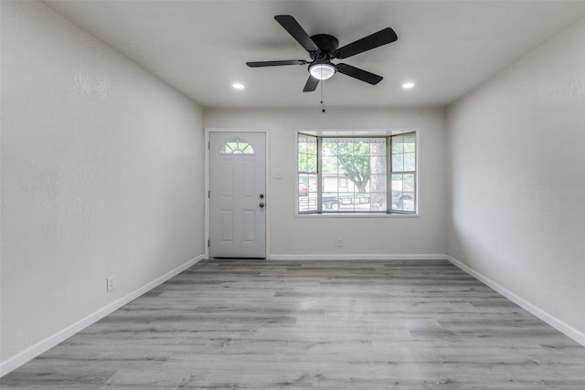 entrance foyer with recessed lighting, baseboards, ceiling fan, and wood finished floors