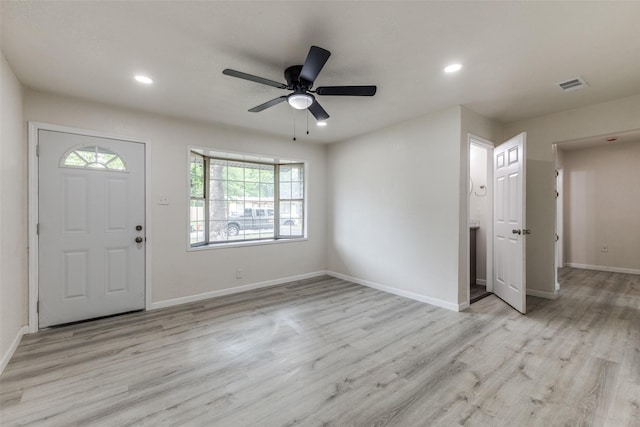 foyer entrance with recessed lighting, baseboards, and wood finished floors