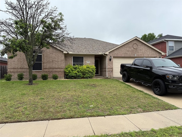 ranch-style house featuring a garage, a front yard, brick siding, a shingled roof, and driveway