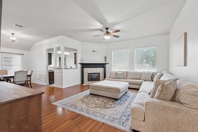 4610 Bluebird Ln, Mansfield, TX 76063 - living area with a ceiling fan, dark wood-type flooring, and a tile fireplace