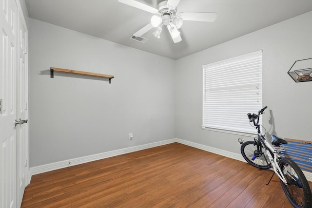 4610 Bluebird Ln, Mansfield, TX 76063 - workout room with wood finished floors, baseboards, and a ceiling fan