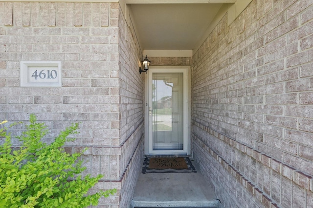 4610 Bluebird Ln, Mansfield, TX 76063 - doorway to property featuring brick siding