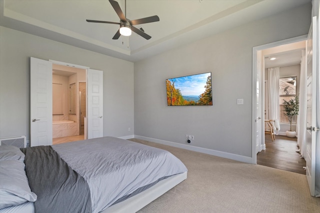 3320 Alexandra Ln, Celina, TX 75009 - bedroom featuring baseboards, connected bathroom, carpet, and a ceiling fan
