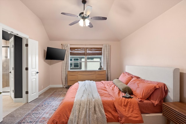 bedroom featuring baseboards, light colored carpet, ceiling fan, and lofted ceiling