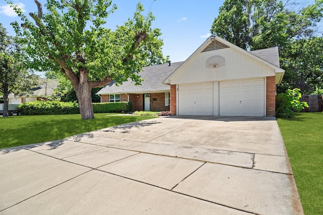 5228 Rutland Ave, Fort Worth, TX 76133 - view of front of home with brick siding, concrete driveway, and an attached garage