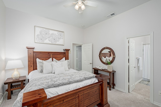bedroom with ceiling fan, baseboards, and carpet