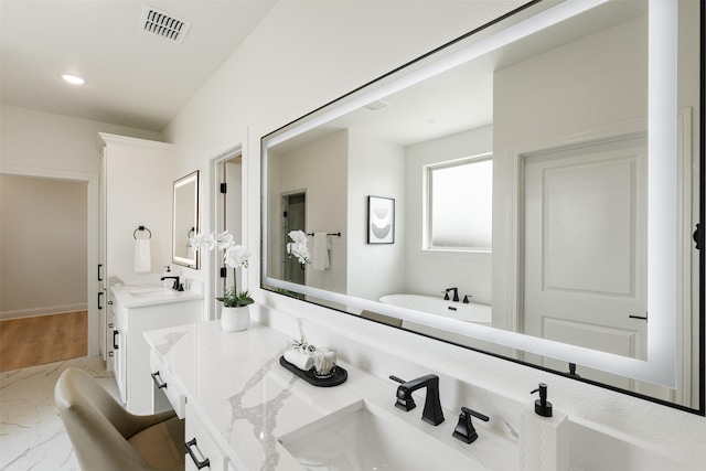 full bath with recessed lighting, visible vents, marble finish floor, and vanity